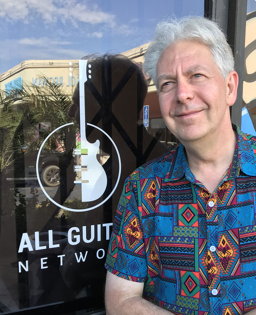 Craig outside the offices of the All Guitar Network
