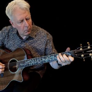 Trying out a rare Taylor acoustic - pic: Pete Bennett